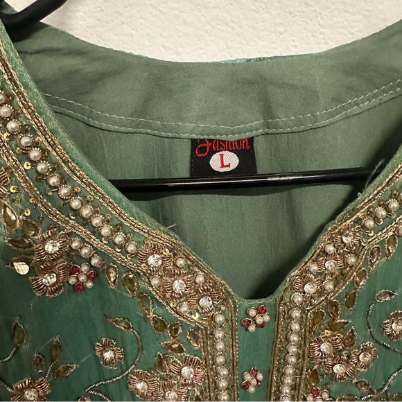 Two piece formal salwar kameez in a soft sea-green shade with intricate gold - Picture 5 of 9